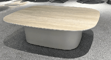A modern outdoor sofa with light-colored textured upholstery, featuring several throw pillows in varying shades of beige, brown, and gray, set against a plain white background.