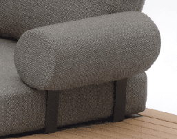 A modern outdoor lounge chair with dark gray cushions and a dark gray, low-profile base.