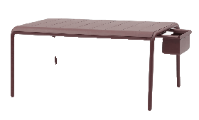 A rectangular outdoor dining table in a dark red or burgundy color, featuring a slatted tabletop and a small, integrated storage caddy on one side.